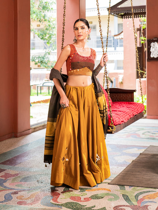 Kutchi Courtyard In Mustard Chaniya Choli Set